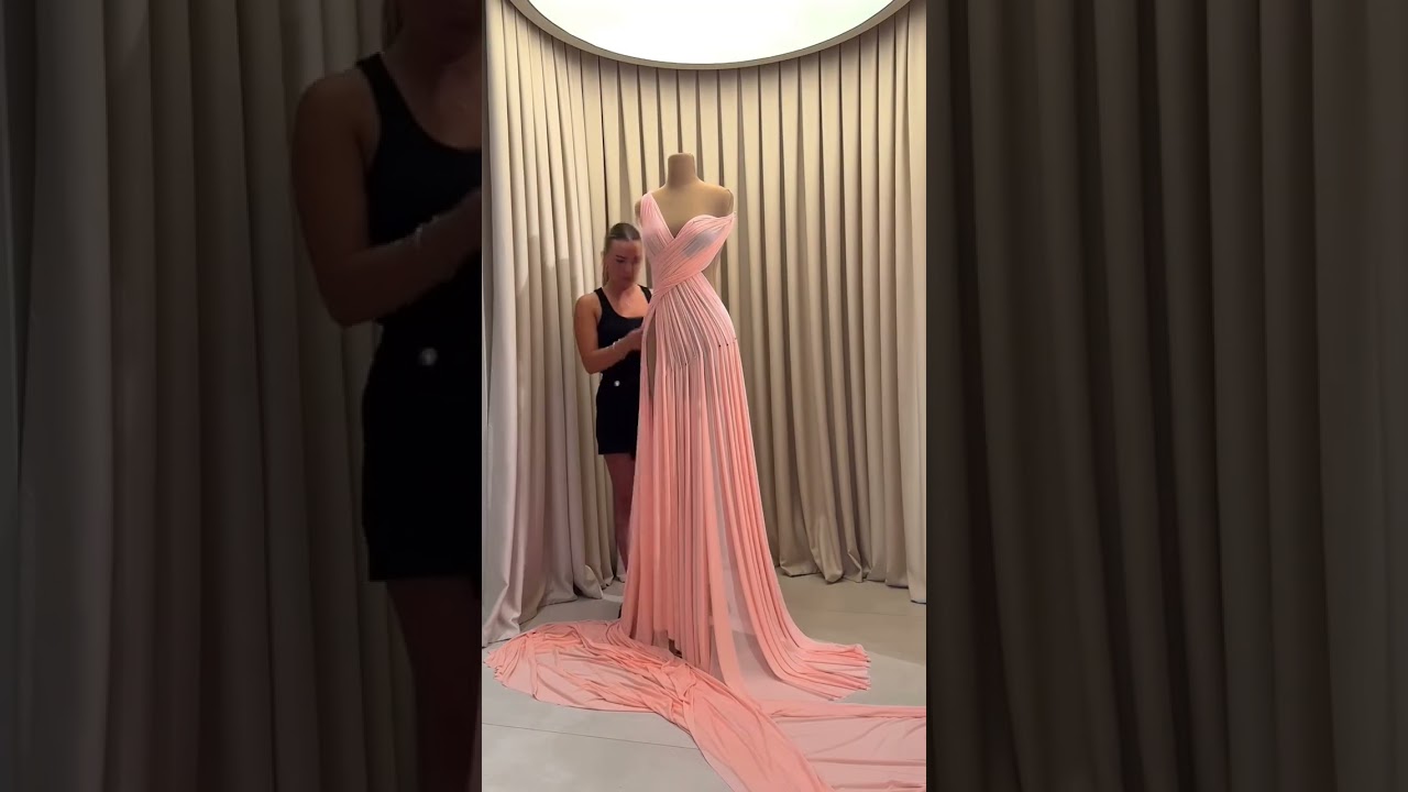 Share with a friend who would own the spotlight in this peach pleated gown! To order, send us a DM