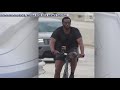 Diddy biking around Miami amid feds raiding his homes