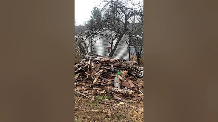 Wood pile and 2liter bottles full of water