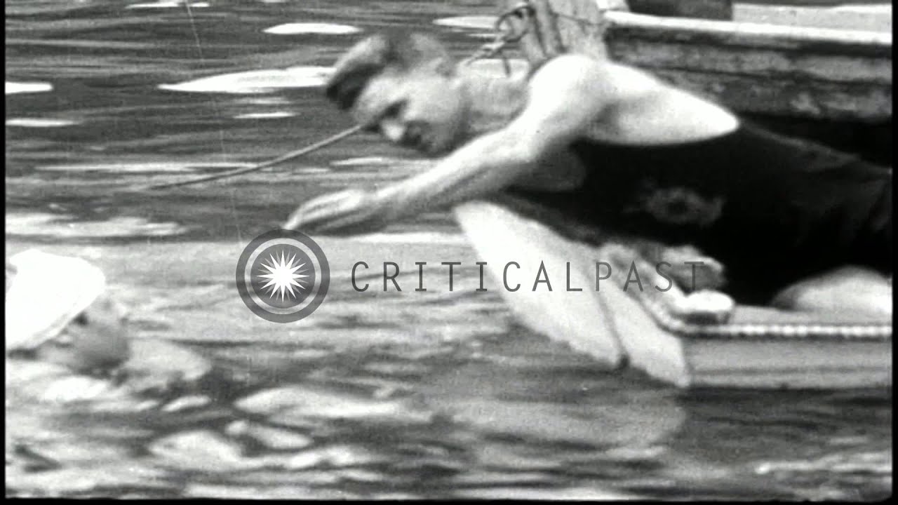 Swimmers take part in the marathon swim and Sam Shields of Miami wins the race in...HD Stock Footage