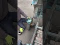 Mechanic Servicing an Electric Utility Vehicle Axle