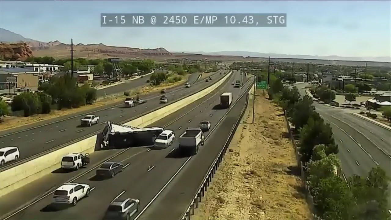 Traffic heavily delayed after rollover blocks two northbound I-15