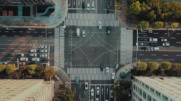 4K Drone Footage Traffic On An Intersection Road In A City