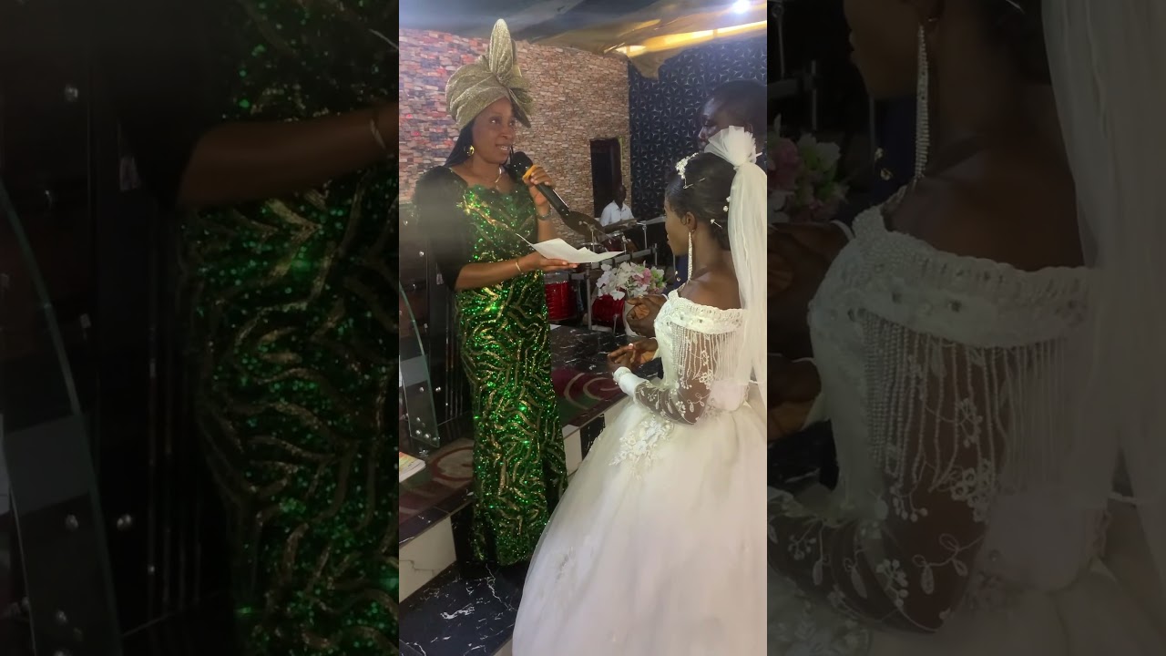 Congratulations new wedding couple as the 1st lady presented the wedding certificate to them.