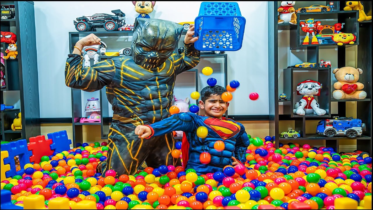 Colorful balls everywhere Superman brings million colored balls YouTube