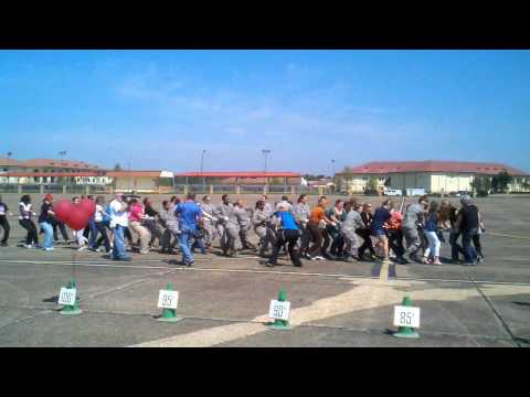 50 women pull a 40 ton C-130 aircraft.