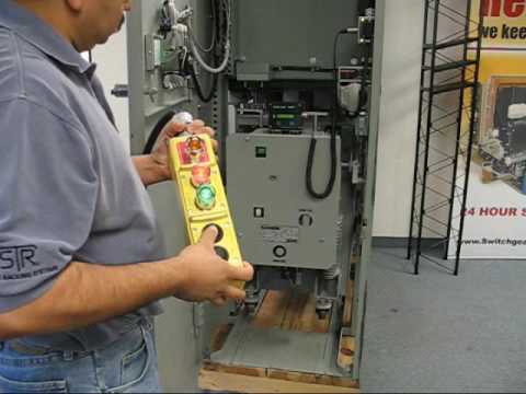 Remote Racking of GE MagneBlast, 5kV, 1200A Circuit Breaker - YouTube