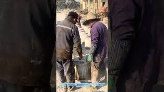 Demolding precast concrete bases for solar panels—factory work in action!
