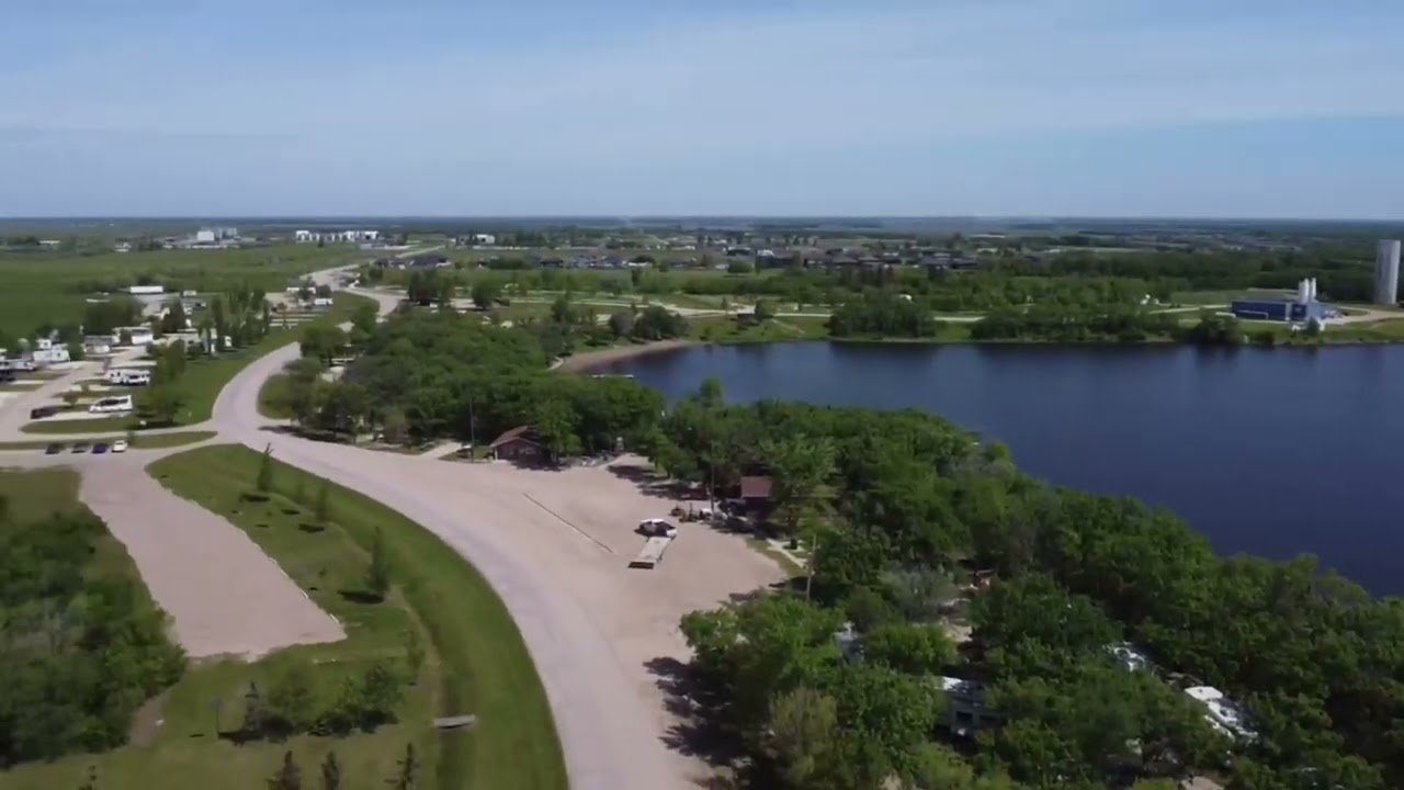 Crocus Real Estate Ltd. 4 Colert Crescent, Morden. Lake Minnewasta.