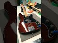 A tasty squier precison bass  on the workbench