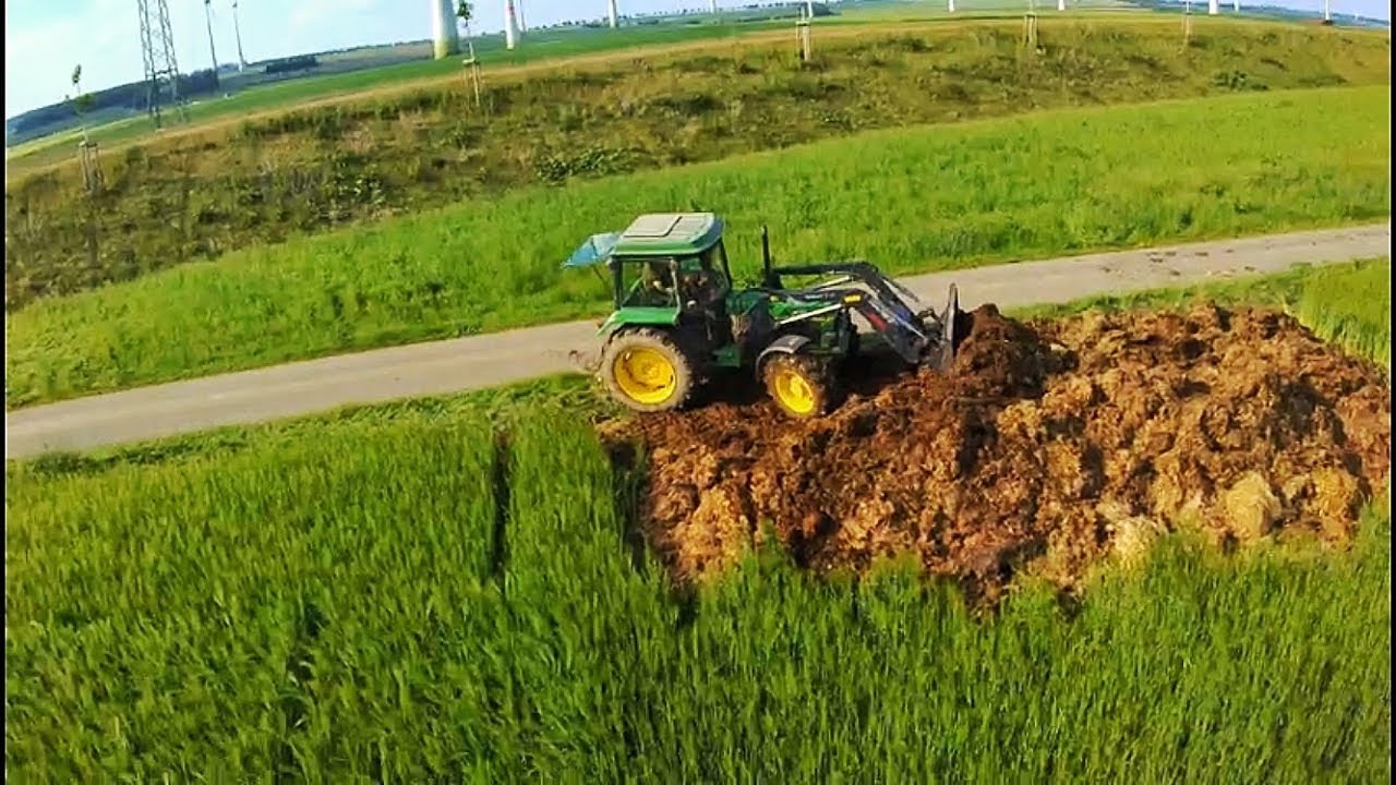 John Deere 3650 + John Deere 2650 am mist Fahren