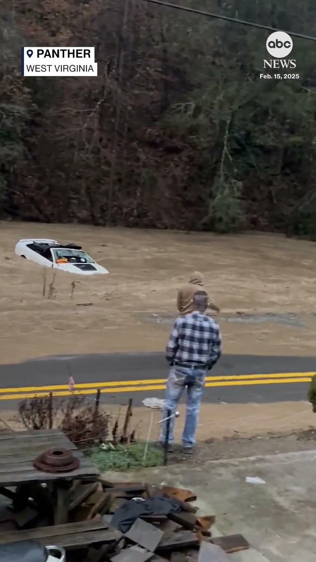 Ford Mustang slams into tree as its swept away amid severe flooding in West Virginia