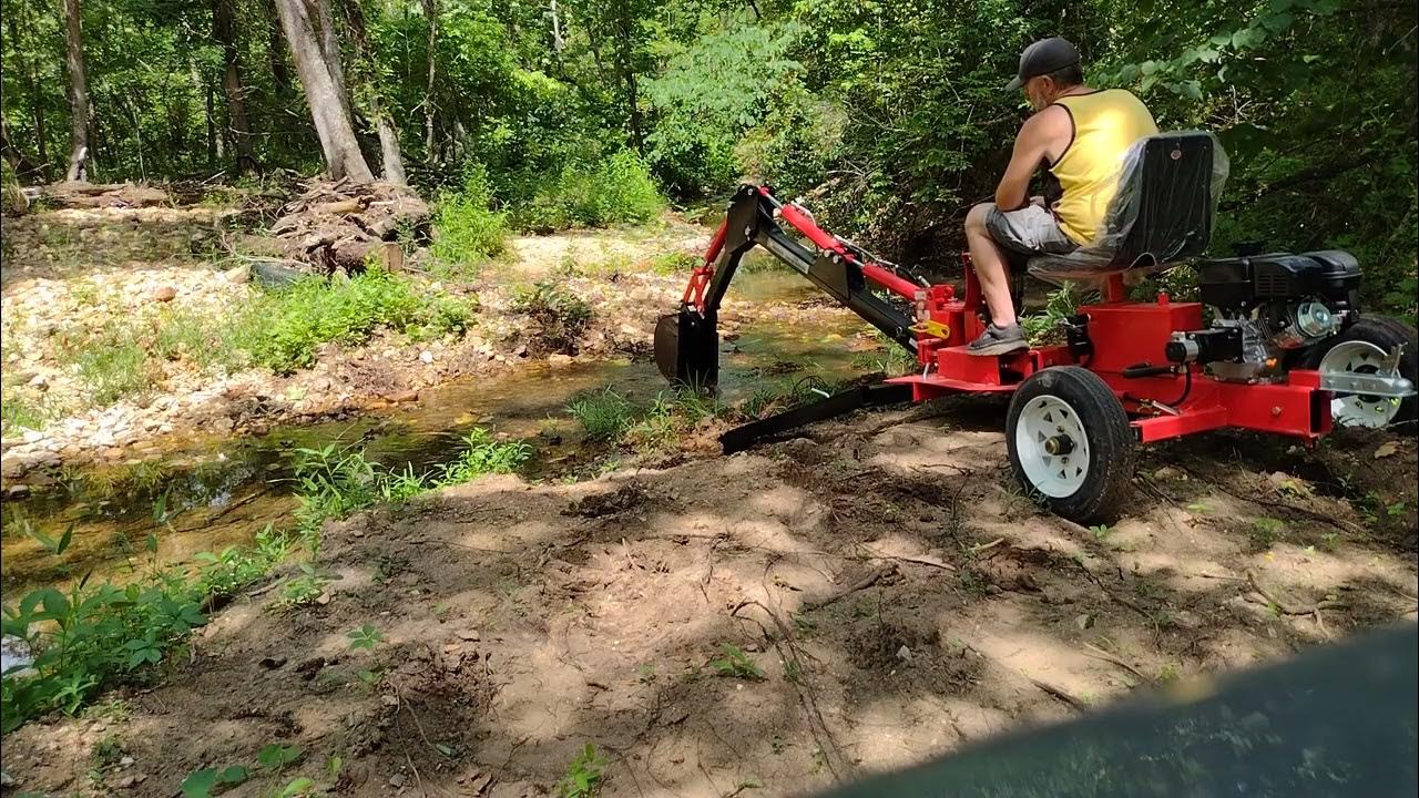 Digging out some creek with the Harbor Freight Backhoe YouTube