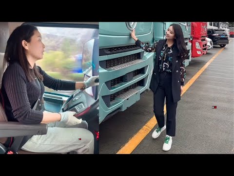 Goods Transportation. Beautiful Female Truck Driver Wei Xiaoyang