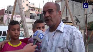 المراجيح اليدوية مساحة للفرح لأطفال مخيم عسكر في مدينة نابلس - (28-6-2017)