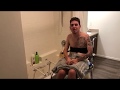 Paralyzed Quad Showers Over A Tub Using Special Chair
