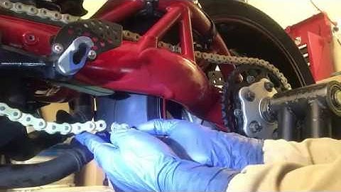 How to remove & install a rivet style master link motorcycle chain.