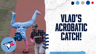 Vladimir Guerrero Jr. makes a sprawling cartwheel catch!