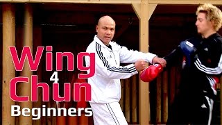 Wing Chun for beginners lesson 48: Block, cover and Elbow to the chest (Pad work)