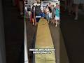 Navigating the city with a 9ft longboard on public transport—surfing’s real adventure! 😂🏄‍♂️🚃