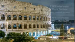 view of Colosseum illuminated at night timelapse in Rome, Italy