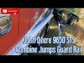 John Deere 9650 STS Combine Jumps Guard Rail