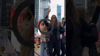 Tourists On Spin Camera Selfie Platform With Rotating Stand
