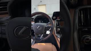 2024 Lexus LX600 Luxury, Caviar with Palomino leather and Brown Open-pore wood trim Lexus With Brown Interior