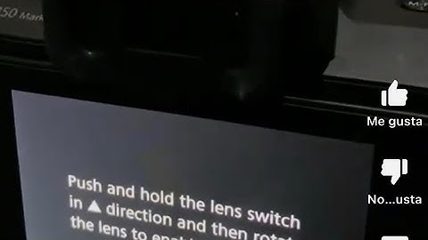 Push and hold the lens switch in A direction and then rotate the lens to enable shooting.Canon M50 2