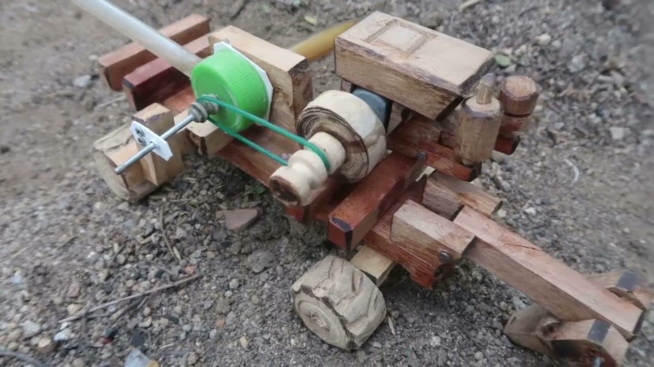 Diy mini water pump from wood make rice farming   diy mini wooden tractor working and rice farming