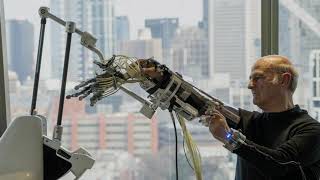 Demonstration by Stelarc and EMU at Mini-symposium on Human-Robot Interaction and Interfacing