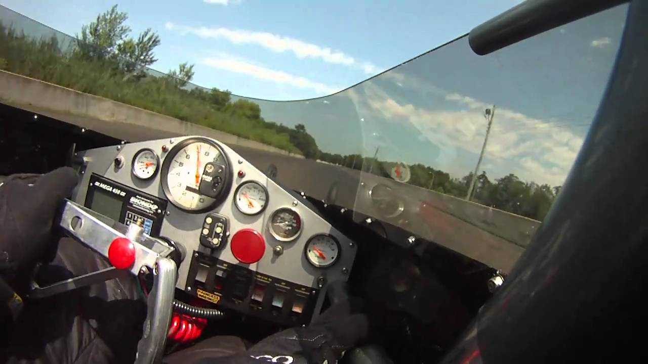 Currie Motorsports driver Levon Currie II's 200mph Top Dragster (on