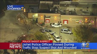 Joliet Police Officer Pinned During Traffic Stop, Officers Shoot And Wound Suspect