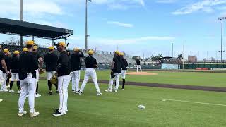Pirates players work on fielding bunts at LECOM Park