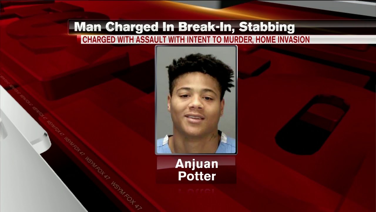 Lansing man charged in stabbing