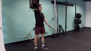 Backpack Single Arm Squat Thruster