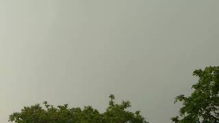 Dark. Clouds.Trees. waiting for rain to pour. wind