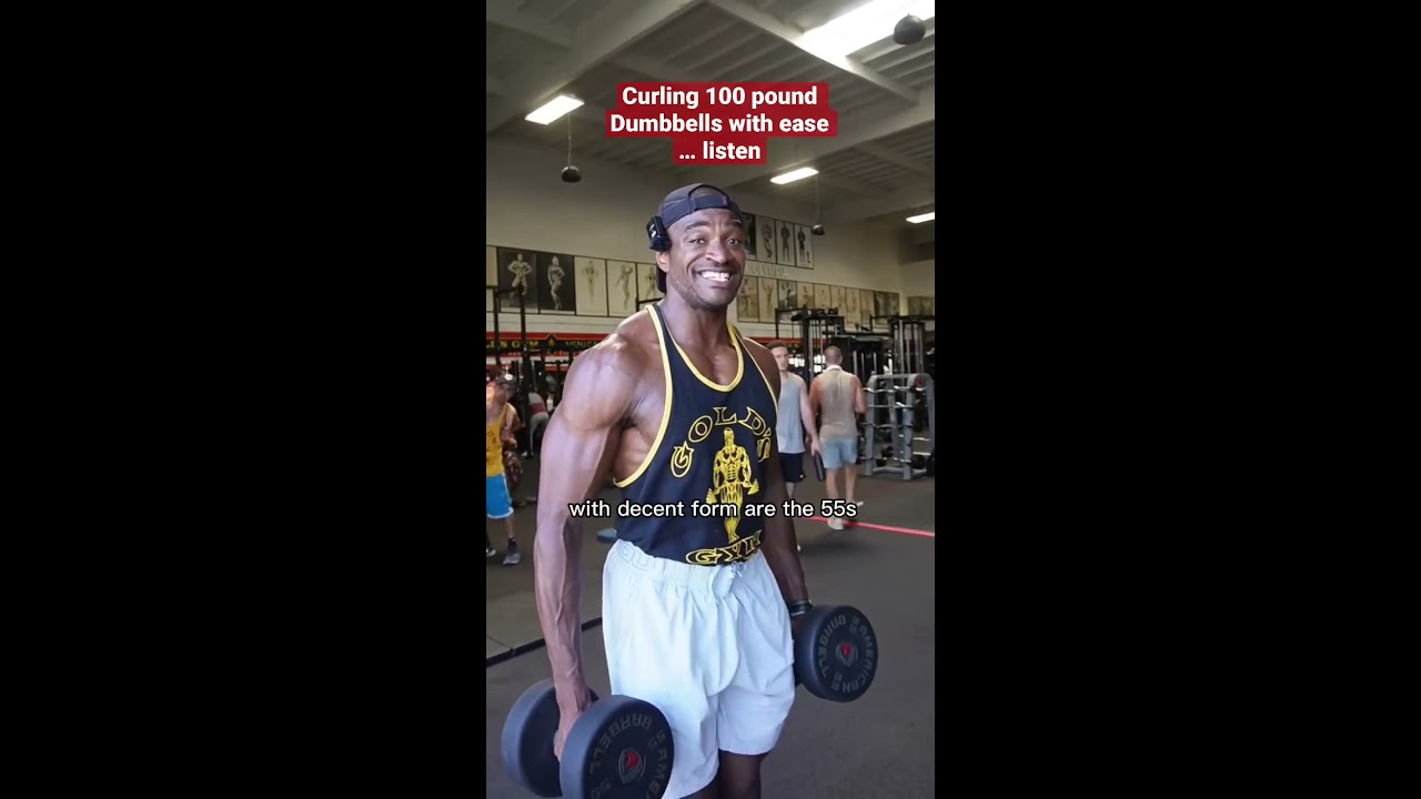 Curling 100 Pound Dumbbells How To Build Big Arms Shorts