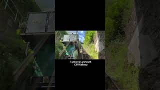 Front ascending POV of The Lynton & Lynmouth Cliff railway.