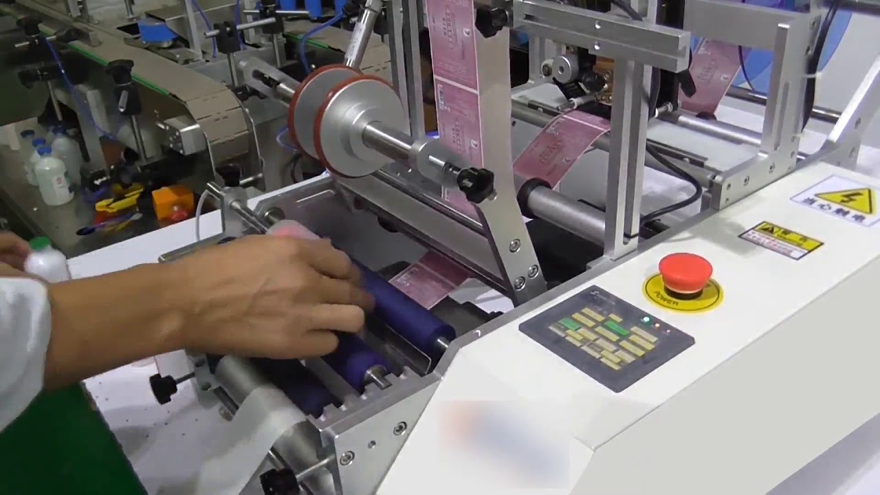 Semi automatic labeling machine for round bottles 