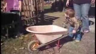 Kevin pushing wagon at pumpkin patch