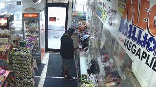 Suspect caught on camera after stealing woman's purse from Detroit gas station