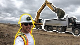 Straight Truckin...getting loaded with massive excavator