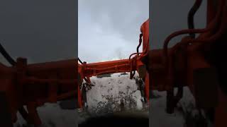 Clearing snow with old Thomas Skid steer
