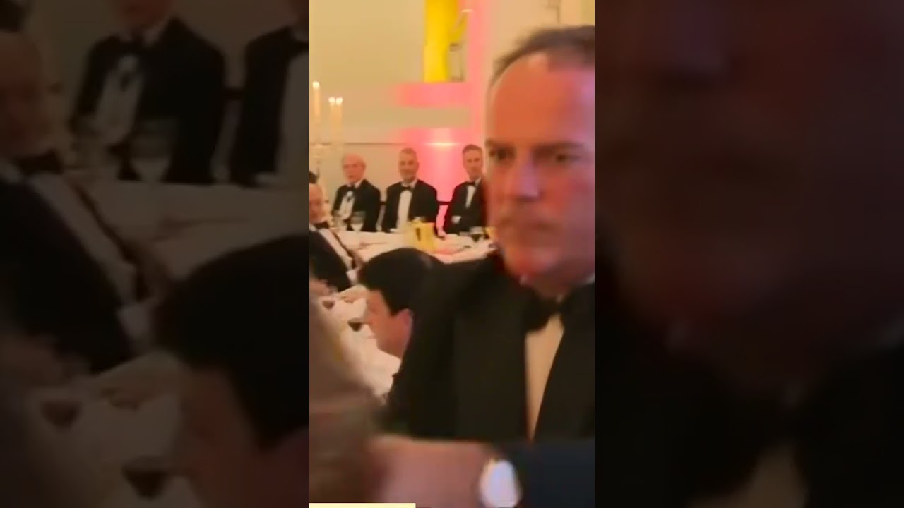 conservative mp mark field grabs climate protester by the neck