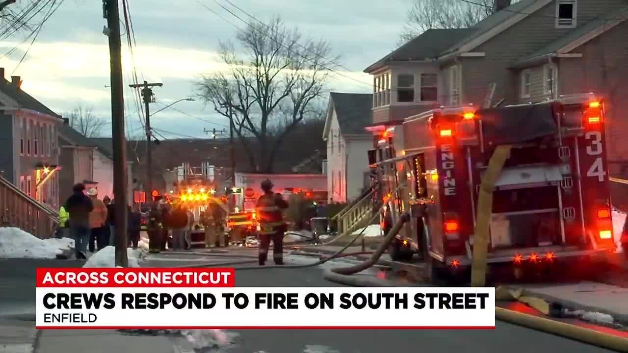 Crews battle house fire on South Street in Enfield - YouTube