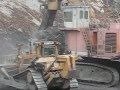 Caterpillar D11R Working with DEMAG H185S