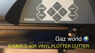 Summa D-60 R vinyl cutter plotter signmaking machine in action cutting vinyl lettering Signwriting