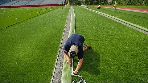 Installing New AstroTurf on Nickerson Field