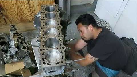 Installing the pistons into the 2JZ